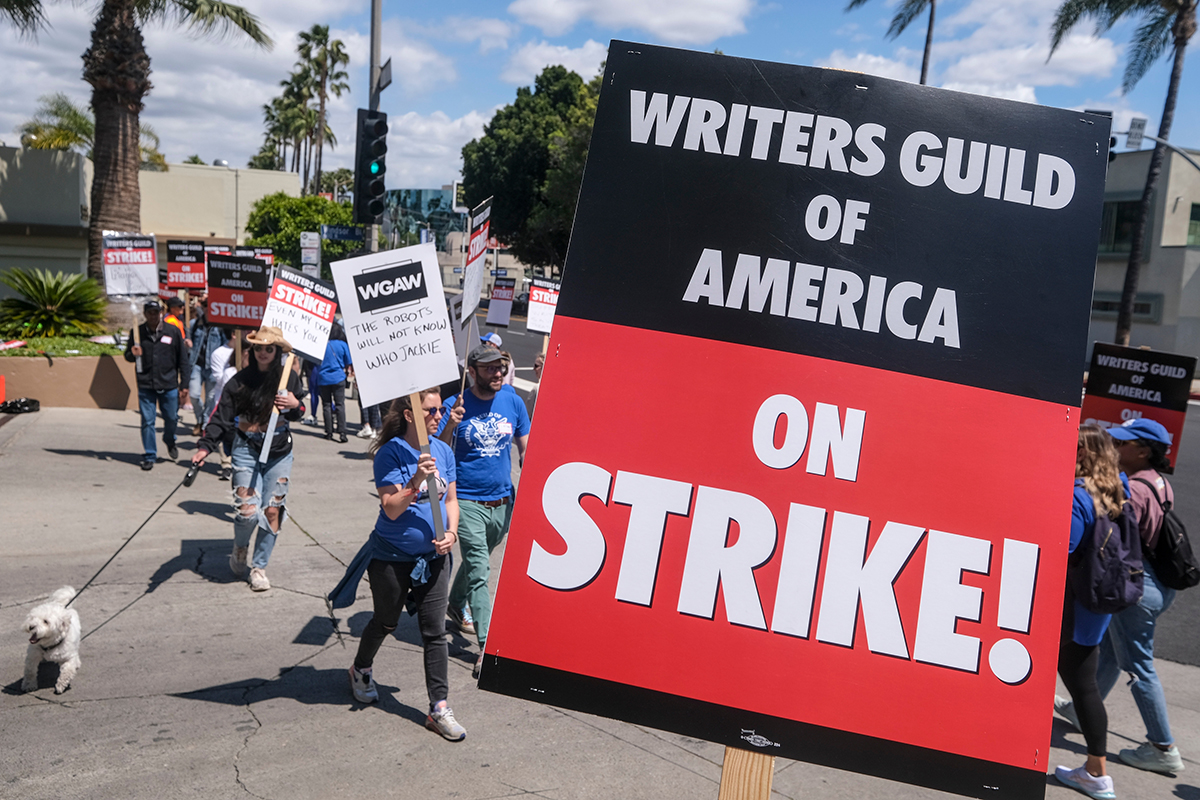 Members of the The Writers Guild of America (WGA) picket outside Paramount Pictures on Friday, May 5, 2023, in Los Angeles.